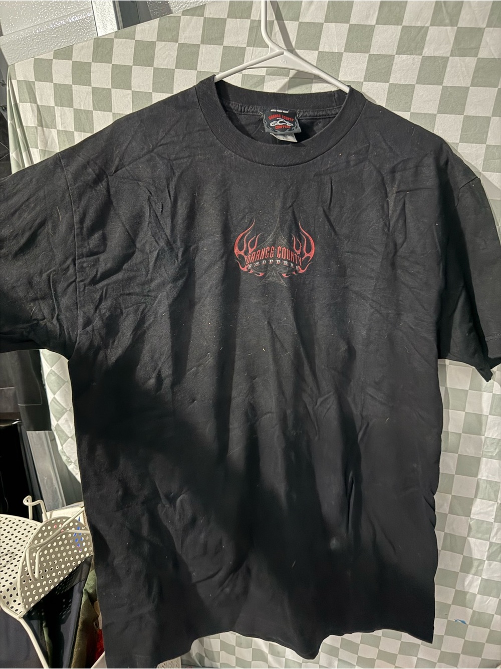 Black Short-Sleeve Graphic Tee with Subtle Red Detail